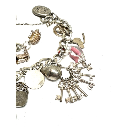 306 - vintages silver charm bracelet weight 44g