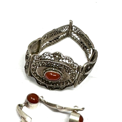 312 - Vintage silver & amber jewellery inc bracelets pendants brooch weight  57g