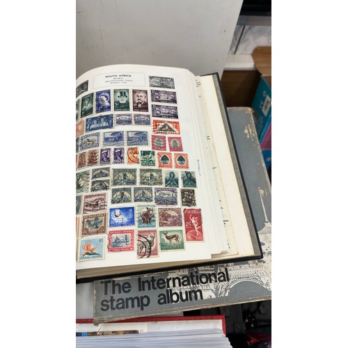 144 - Large selection of assorted stamps and albums