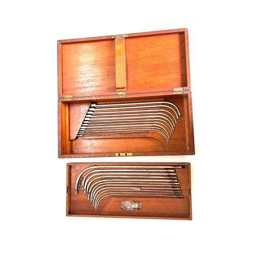 601 - Antique 19th century mahogany cased medical instruments, two layers of catheters, box measures appro... 