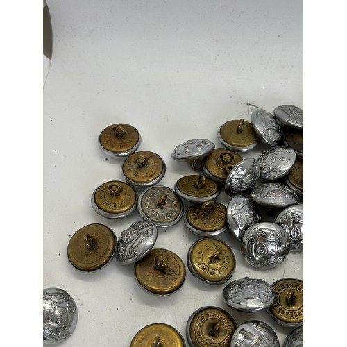 587 - Selection of approximately 150 vintage Leeds fire brigade metal tunic buttons, manufacturers to incl... 