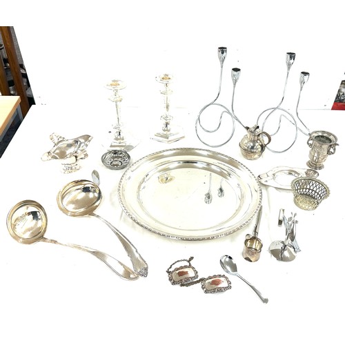 104 - Selection of silver plate items to include candle sticks, pen, trays etc