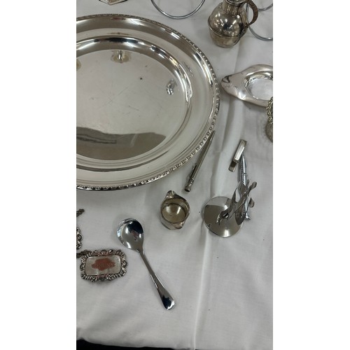 104 - Selection of silver plate items to include candle sticks, pen, trays etc