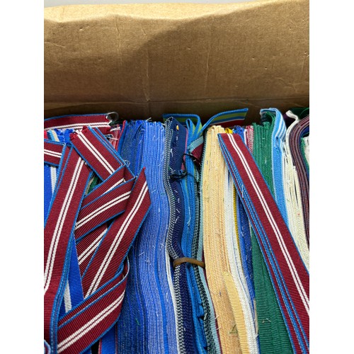 594 - Dealers lot - 3 boxes of cut lengths of full size and miniature British medal ribbon