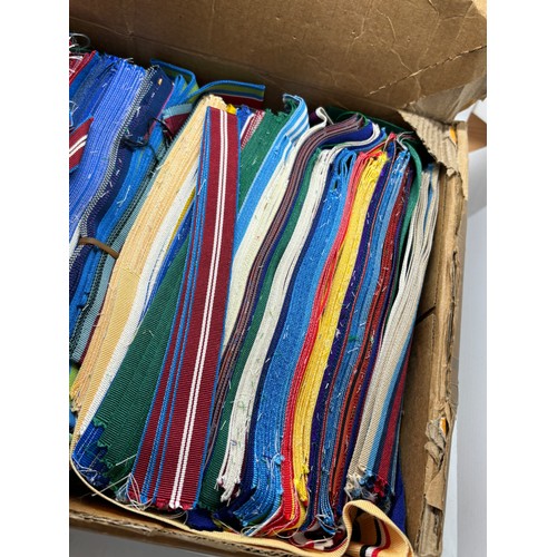 594 - Dealers lot - 3 boxes of cut lengths of full size and miniature British medal ribbon