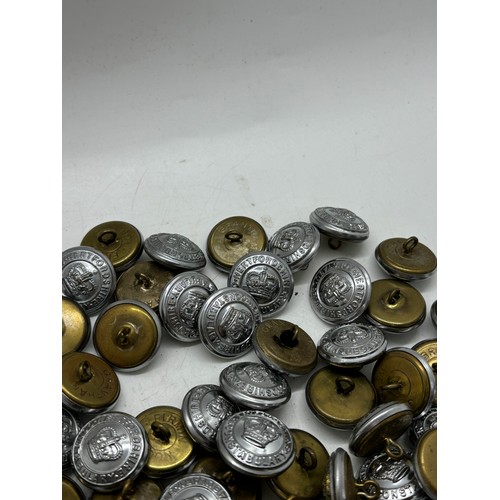 592 - Approximately 150 vintage Halifax Fire Brigade tunic buttons manufactured by Gaunt of London and But... 