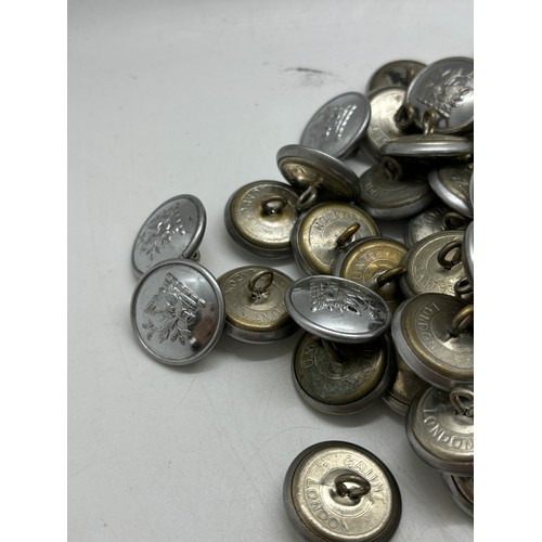 597 - Approximately 150 Vintage metal tunic buttons with a wild boar logo, Manufactured by Gaunt of London