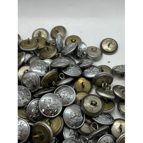 597 - Approximately 150 Vintage metal tunic buttons with a wild boar logo, Manufactured by Gaunt of London