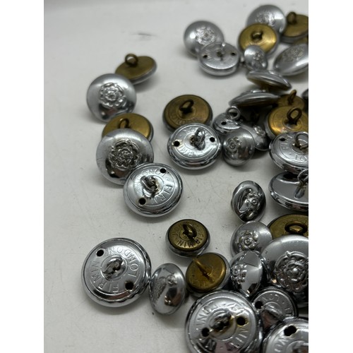 596 - Approximately 50 Tunic and 40 sleeve vintage metal buttons for West Yorkshire fire service, manufact... 