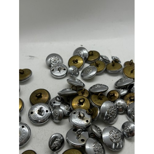 596 - Approximately 50 Tunic and 40 sleeve vintage metal buttons for West Yorkshire fire service, manufact... 