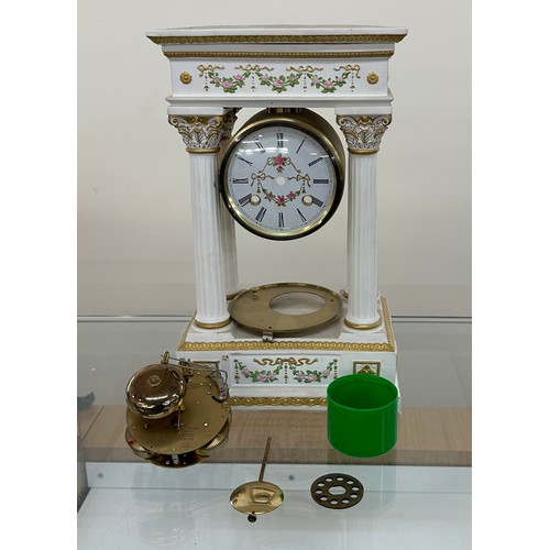 94 - Hand painted column mantel clock in need of attention measures approx 14 inches tall by 9 wide