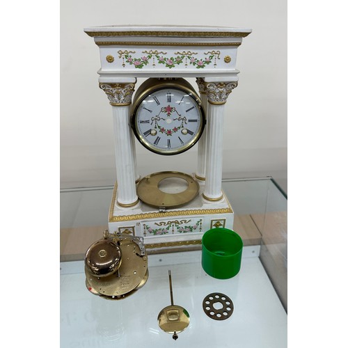 94 - Hand painted column mantel clock in need of attention measures approx 14 inches tall by 9 wide