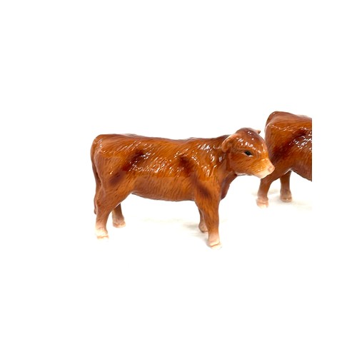 22 - Two vintage brown Beswick calves