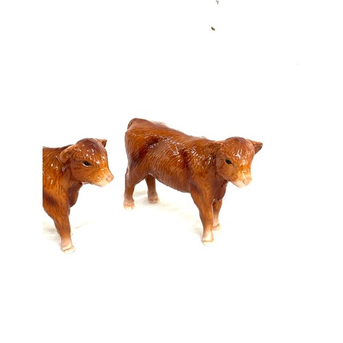 22 - Two vintage brown Beswick calves