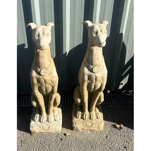 100B - Pair of concrete dogs measures approximately 31 inches tall