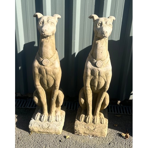 100B - Pair of concrete dogs measures approximately 31 inches tall