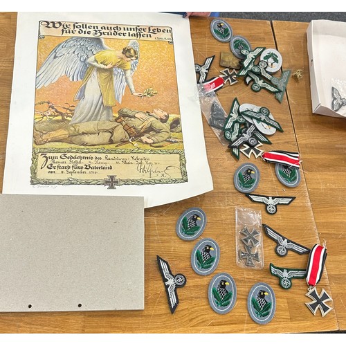 90 - Reproduction WW1 and WW2 German Iron crosses and an Insignia and WW1 memorial scroll