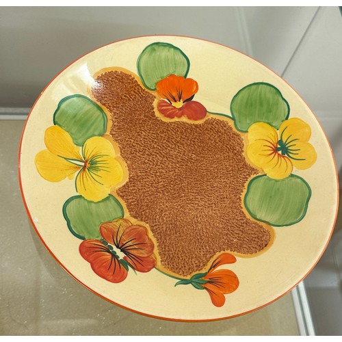 622 - Hand painted Clarice Cliff plate measures approximately 9 inches diameter