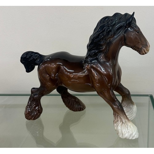 619 - Porcelain Beswick horse figure measures approximately 9 inches wide by 9 inches tall