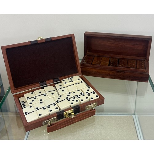 87 - Two sets of vintage cased dominoes