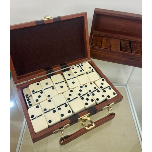 87 - Two sets of vintage cased dominoes