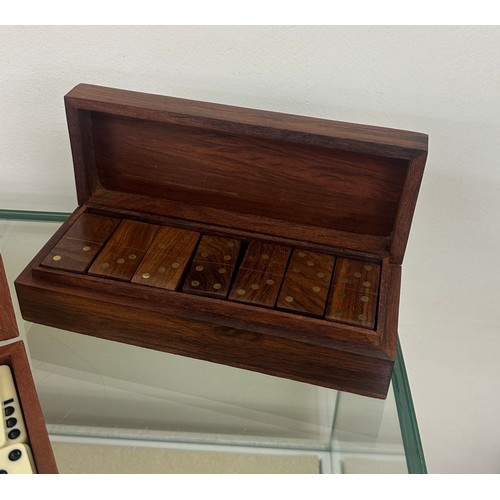 87 - Two sets of vintage cased dominoes