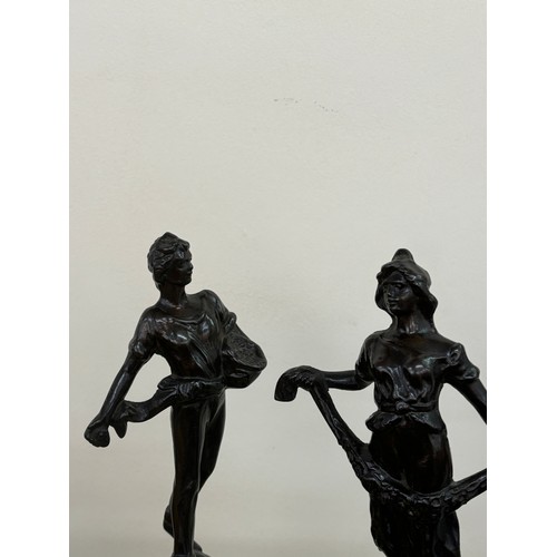 33 - 2 Vintage bronze sculptures measures approximately 10 inches tall