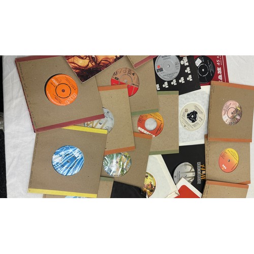 29 - Selection of 45's to include various artists and genres