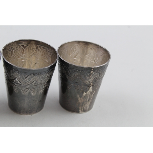 63 - 4 x .950 silver shot / drinking cups