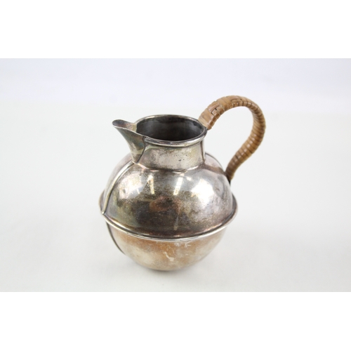 66 - vintage .925 sterling silver novelty cream jug