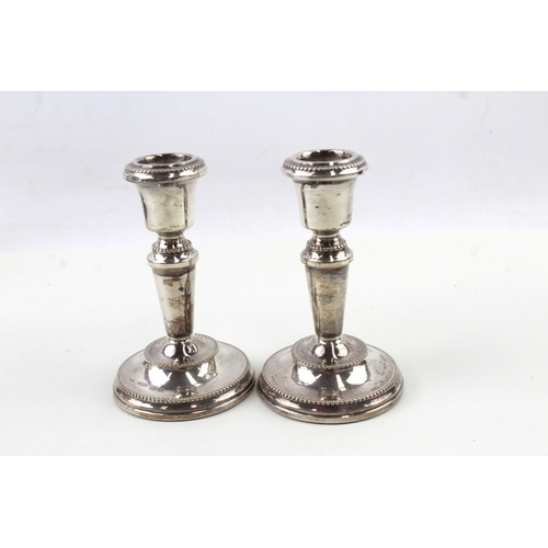 94 - Vintage .925 sterling silver filled candlesticks