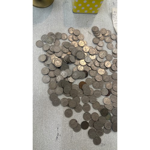 89 - Four vintage money boxes and a selection of six penny pieces