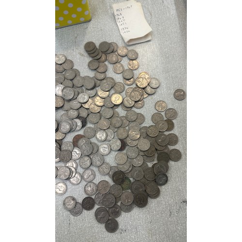 89 - Four vintage money boxes and a selection of six penny pieces