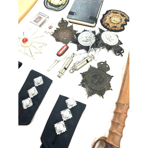 576 - Selection of police ephemera includes cloth badges and truncheons