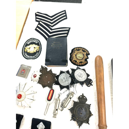 576 - Selection of police ephemera includes cloth badges and truncheons