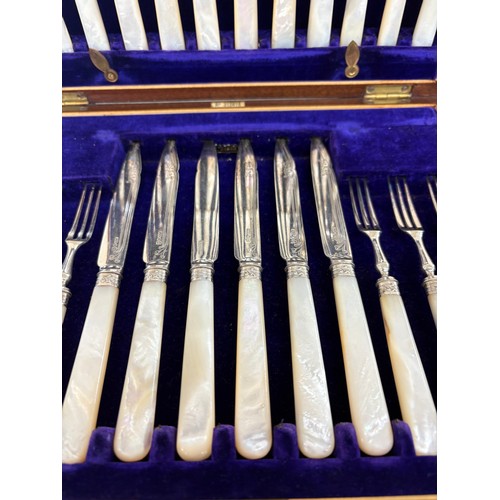 86 - Cased set of silver plated dessert knives and forks by A & D Sheffield, mother of pearl handles