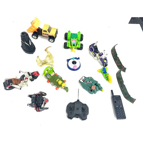 70 - Selection of vintage action figure accessories to include cars etc