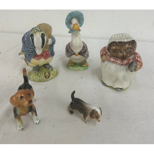 95 - Three Beatrix potter figures includes Jemima puddleduck, Tommy brock, Mrs tiggy winkle etc