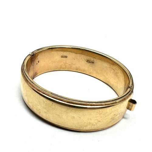 99 - Vintage 9ct gold metal core bangle weight 31g