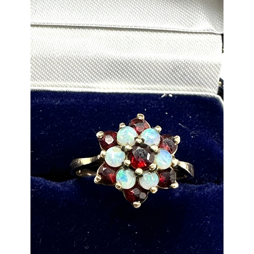 101 - 9ct gold garnet & opal ring weight 2.6g