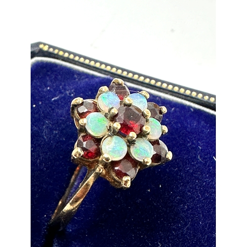 101 - 9ct gold garnet & opal ring weight 2.6g