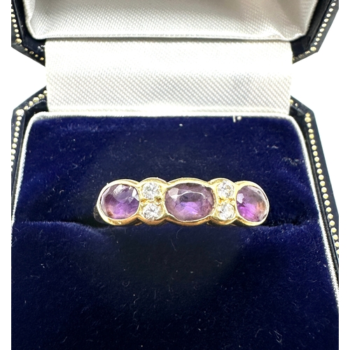 104 - 18ct gold diamond & amethyst ring weight 3.9g