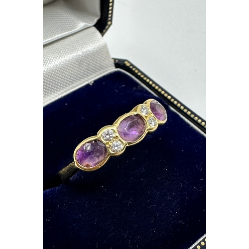 104 - 18ct gold diamond & amethyst ring weight 3.9g