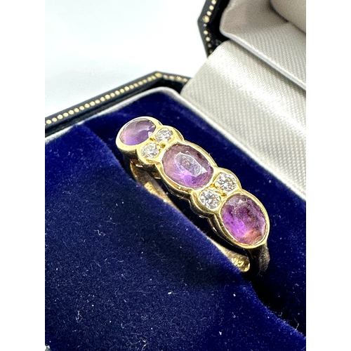 104 - 18ct gold diamond & amethyst ring weight 3.9g