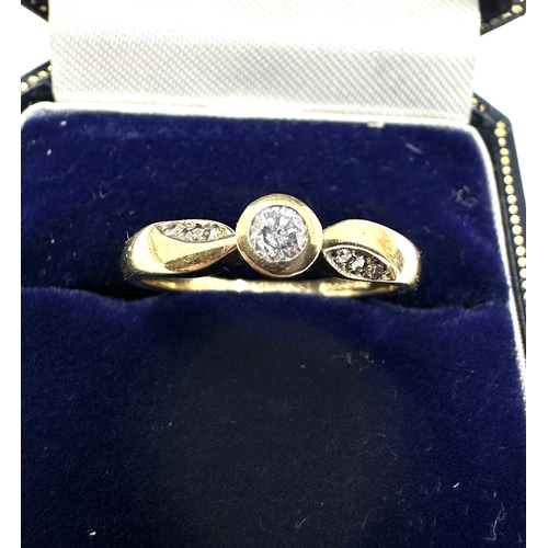 112 - 9ct gold diamond ring set with single stone diamond  & diamond shoulders weight 2.1g .16ct diamond