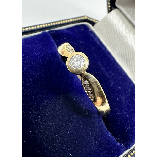 112 - 9ct gold diamond ring set with single stone diamond  & diamond shoulders weight 2.1g .16ct diamond