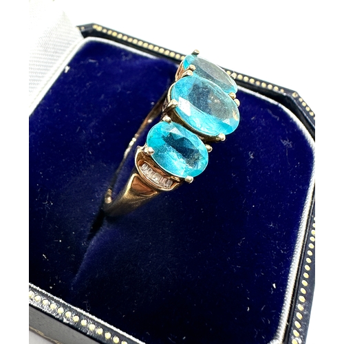 113 - 9ct gold blue tourmaline  & diamond ring weight 2.7g