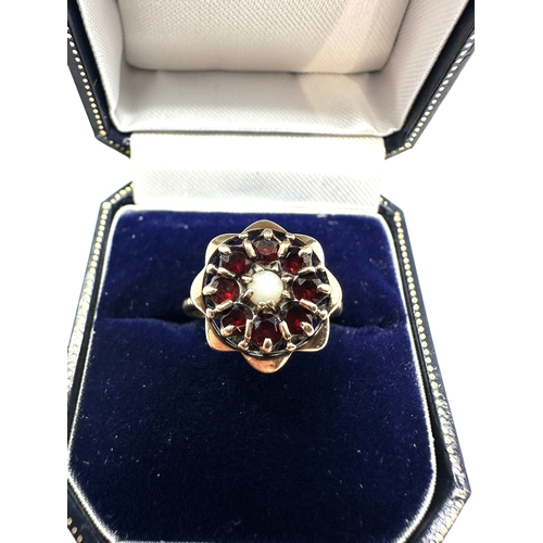 122 - 9ct gold garnet & opal ring weight 2.9g