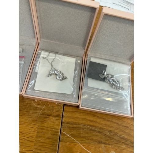 577 - 5 Boxed silver and stone set Diamonique necklaces etc