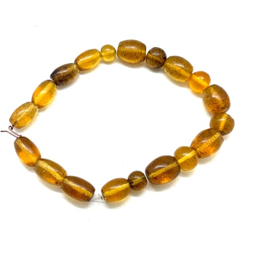 560 - Vintage amber and horn bead necklace, plus one other